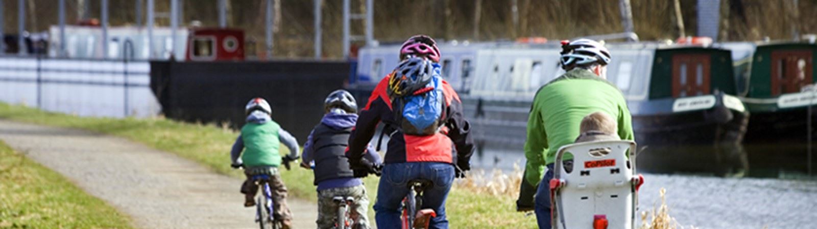 Family Cycling Along Canal Towpath At The Falkirk Wheel C Peter Sandgroundjpg